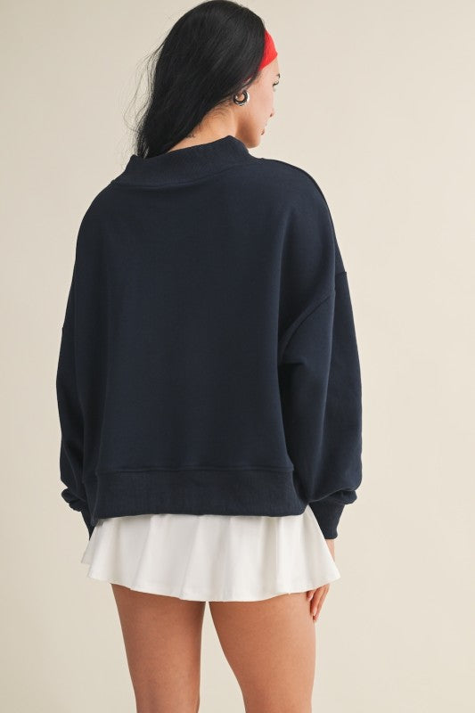 Salty Oversized Mock Neck Sweatshirt with patchwork detail